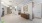 The Reed leasing office and lobby with plush seating areas and side tables